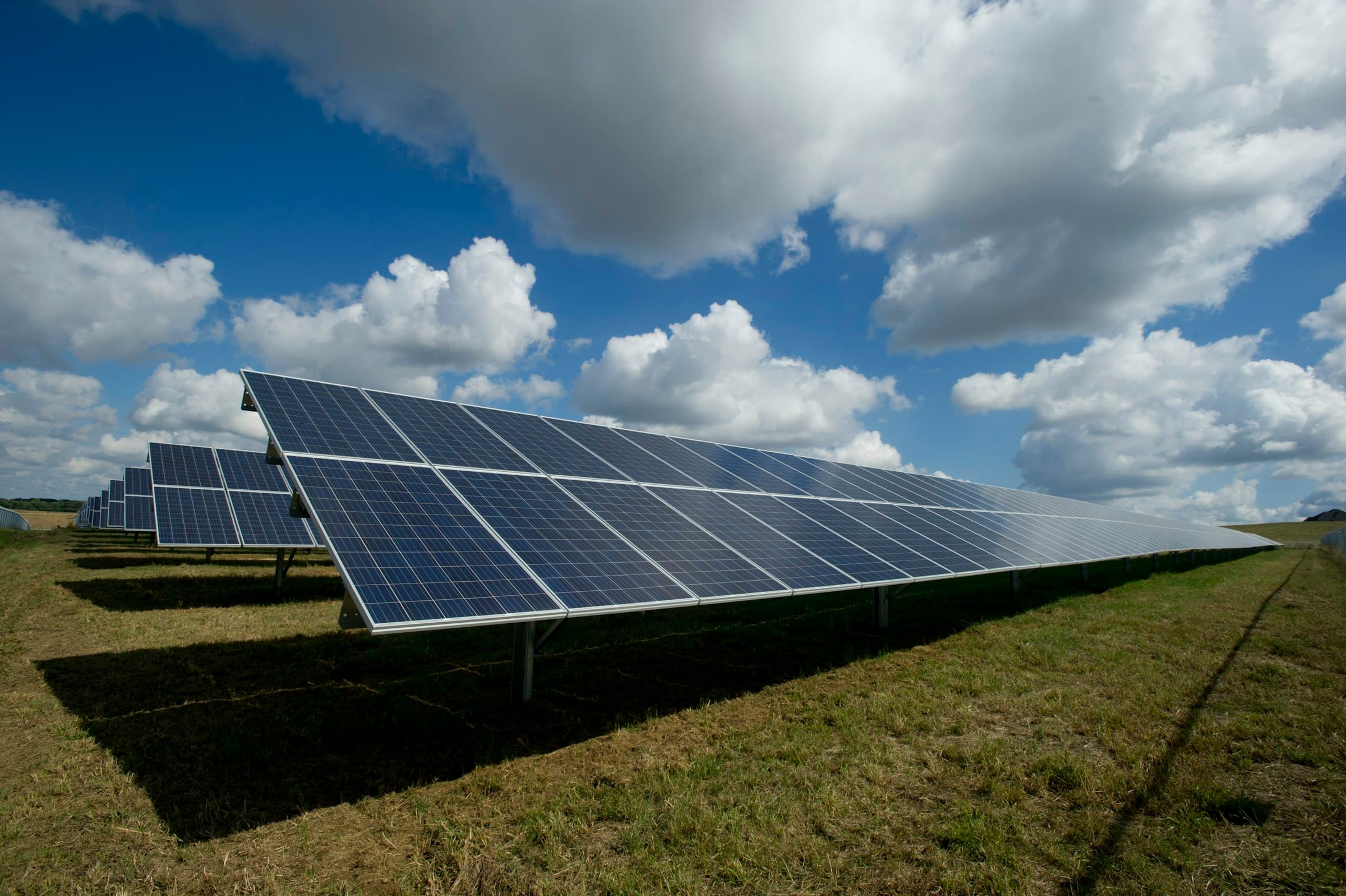 Solar panels on the roof of a residential house, representing home energy performance